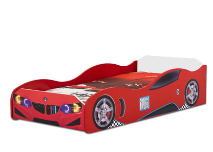 Race to bed! Kids will love the Boca Twin Kit Race Car Bed. The design includes a rear spoiler and decals of a front grille, racing tires, and headlights. 